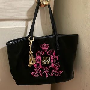 Juicy Couture bag with keychain attached, black and pink with velvet fabric.